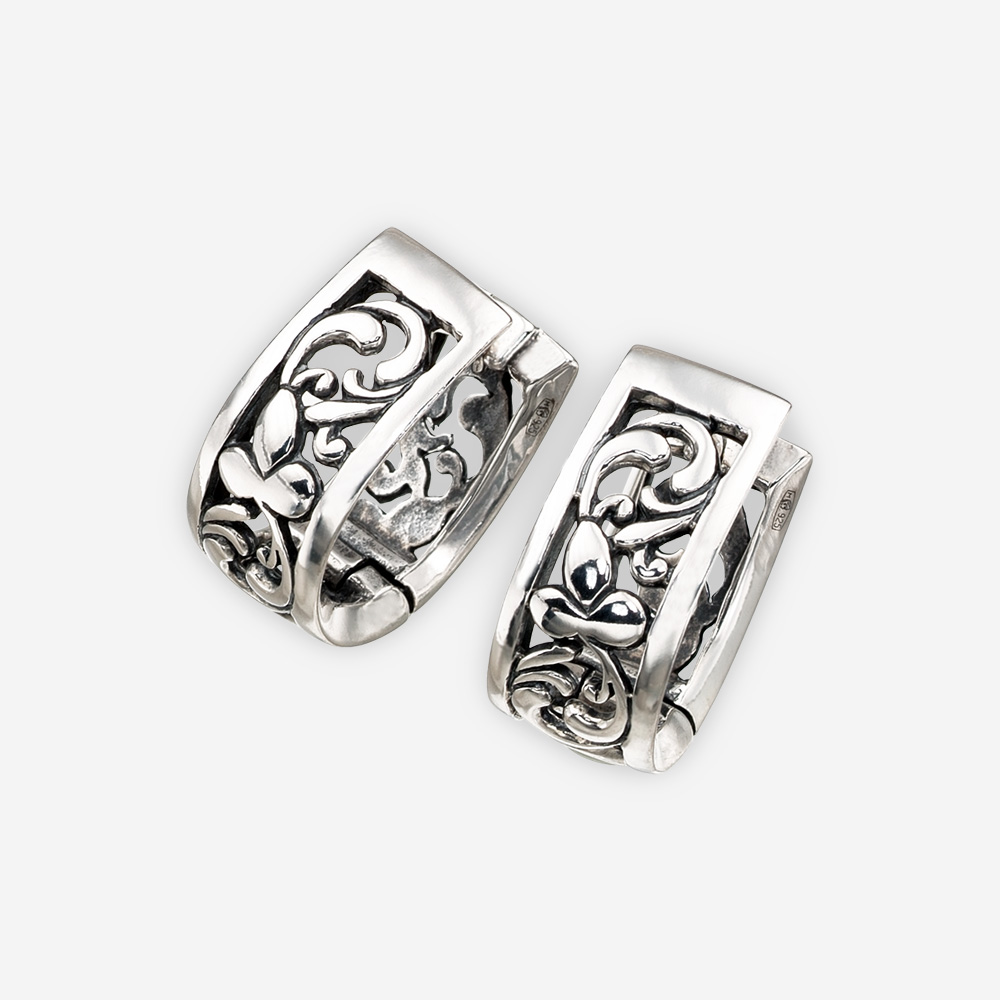 Aretes de filigrana florales de plata con detalle de acento de hoja en relieve de plata fina.