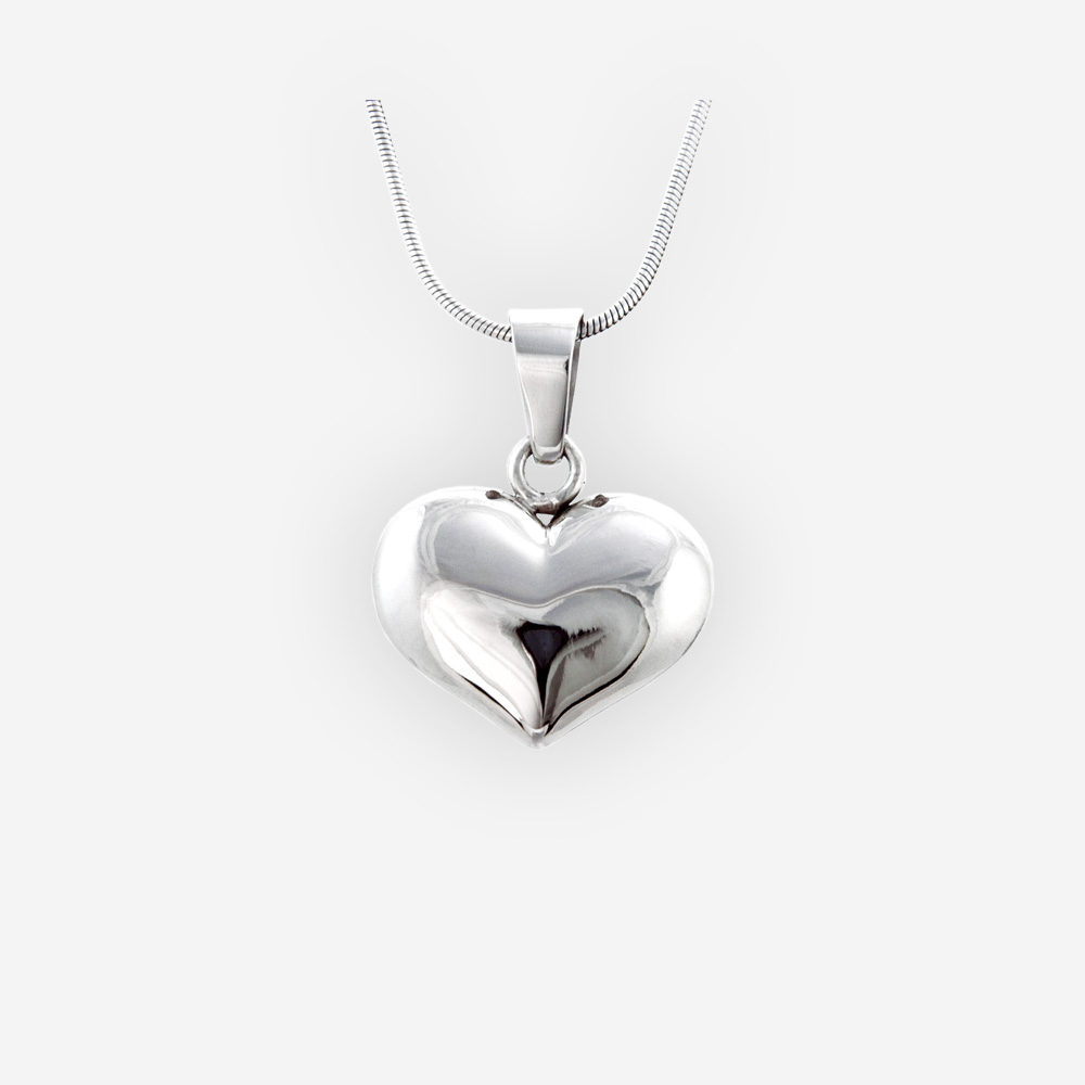 Sterling silver heart pendant is crafted in polished 925 sterling silver.