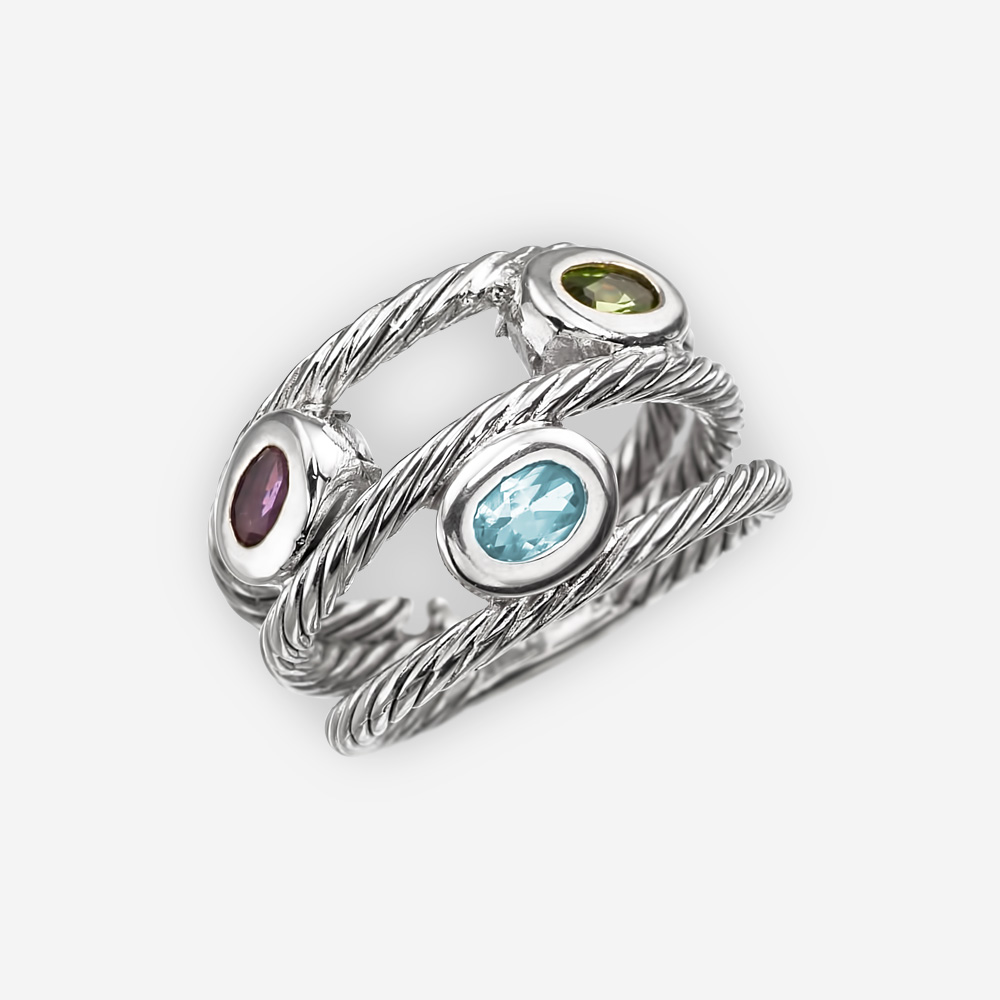 Anillo de plata trenzado de cable con bandas de triple capa y amatista ovalada, topacio azul y gemas peridoto.