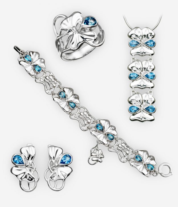 The Viola jewellery collection of sterling silver jewellery featuring violet's petals and leaves elements and topaz